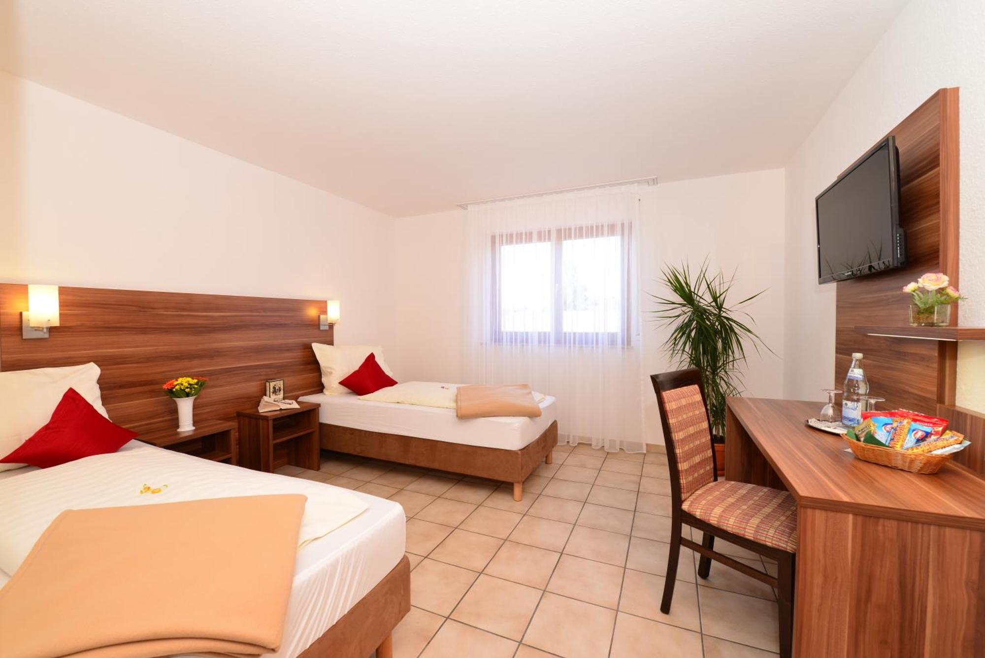 Hotel Am Buchwald Esslingen am Neckar Pokoj fotografie